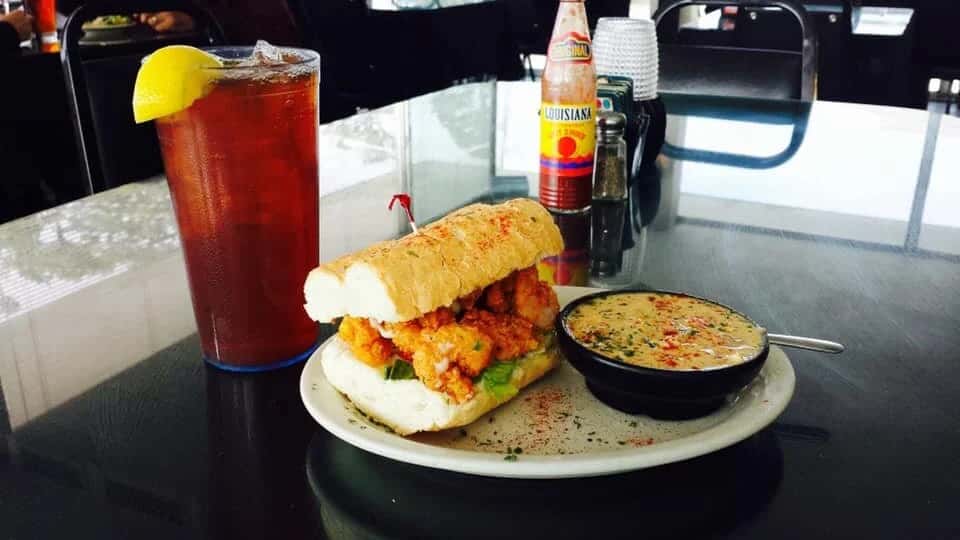 Poboy Bisque recipe served on a plate, by Cafe Rue Orleans - Cajun & Seafood Poboy Bisque recipe served on a plate, by Cafe Rue Orleans - Cajun & Seafood