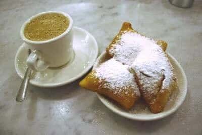 Beignet and Chickory recipe served on a plate, by Cafe Rue Orleans - Cajun & Seafood Beignet and Chickory recipe served on a plate, by Cafe Rue Orleans - Cajun & Seafood