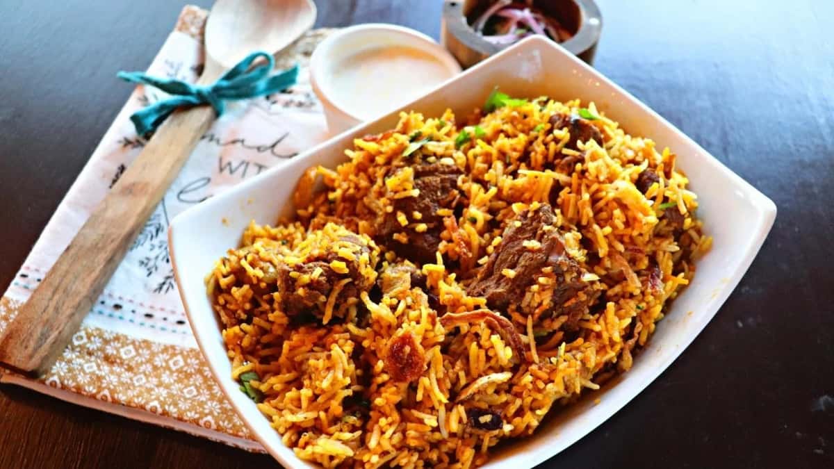 Lamb Biryani recipe served on a plate, by Passage To India Restaurant Lamb Biryani recipe served on a plate, by Passage To India Restaurant