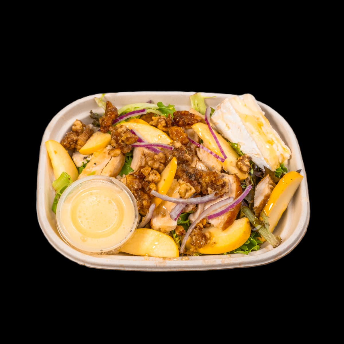 Apple & Brie Chicken Salad recipe served on a plate, by In Season Harvest Kitchen Apple & Brie Chicken Salad recipe served on a plate, by In Season Harvest Kitchen