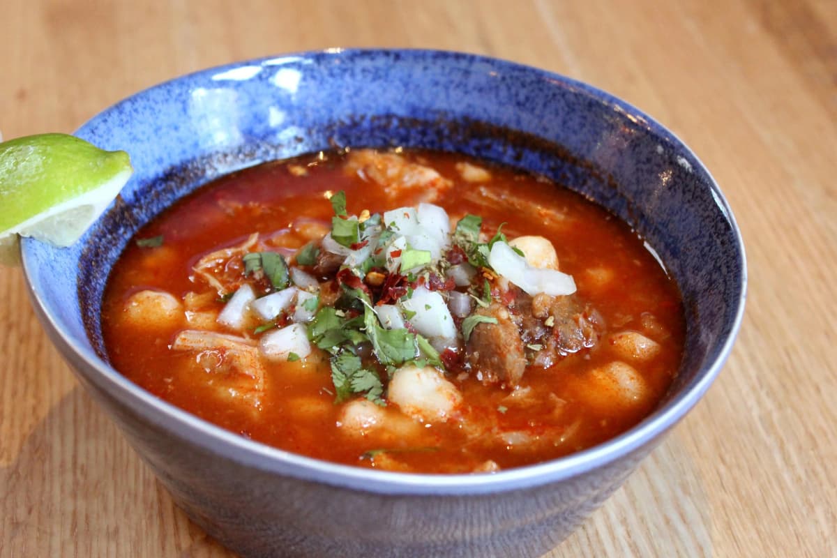 Posole recipe served on a plate, by Malo Posole recipe served on a plate, by Malo