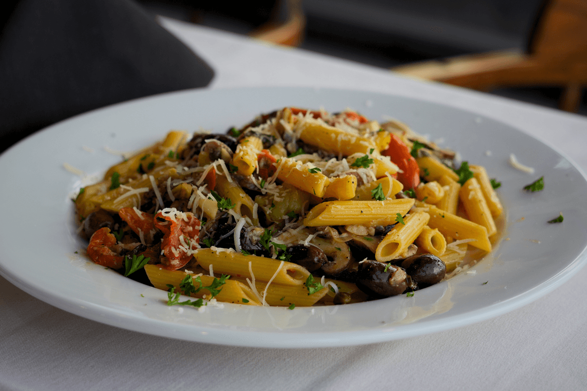 Mediterranean Pasta recipe served on a plate, by Sandpiper Mediterranean Pasta recipe served on a plate, by Sandpiper