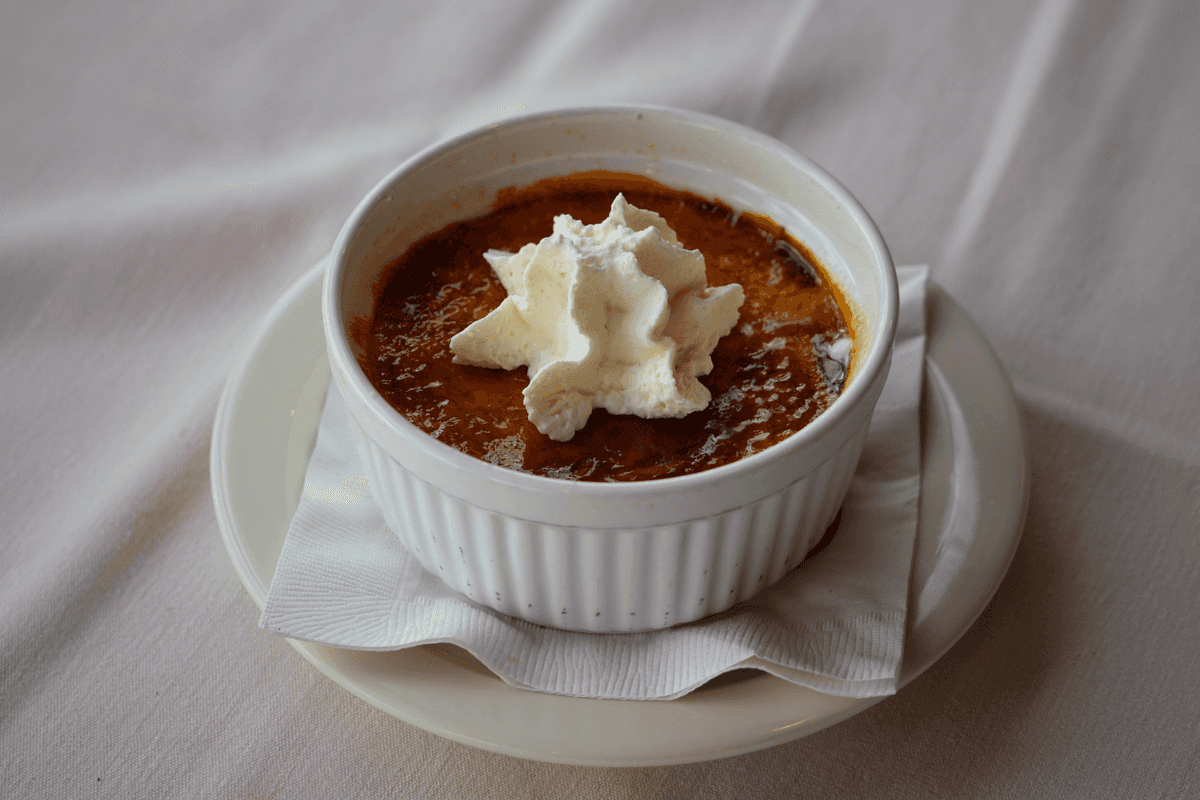Crème Brûlée recipe served on a plate, by Sandpiper Crème Brûlée recipe served on a plate, by Sandpiper