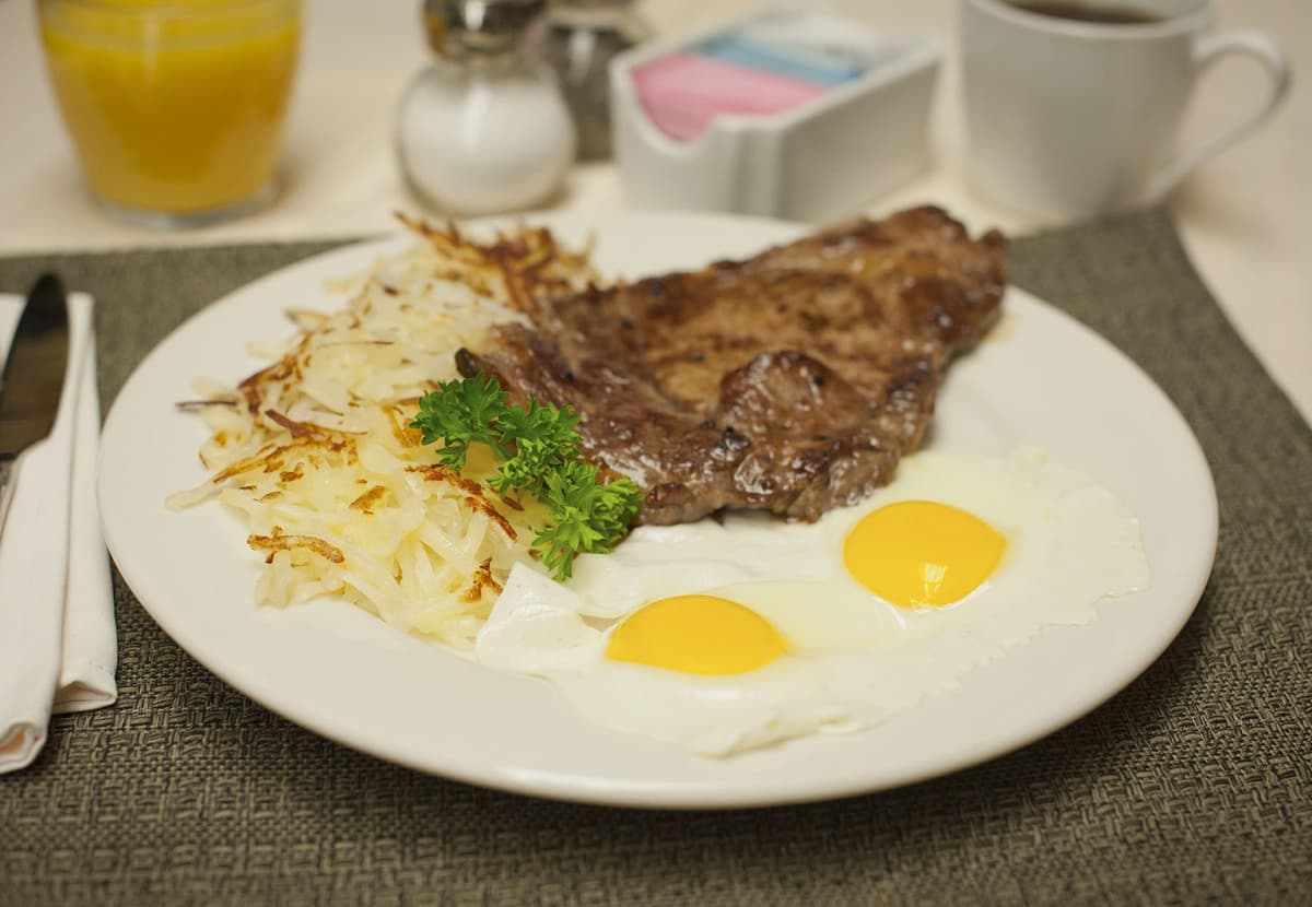 Steak and Eggs recipe served on a plate, by Star 66 Cafe Steak and Eggs recipe served on a plate, by Star 66 Cafe