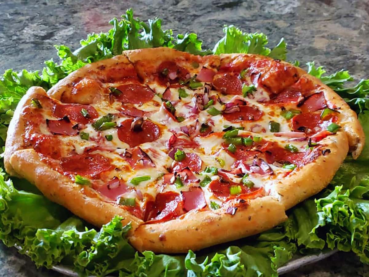 Pizza With Lettuce recipe served on a plate, by PIAZZANO'S Pizza With Lettuce recipe served on a plate, by PIAZZANO'S