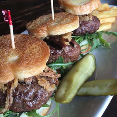 Sliders recipe served on a plate, by Kailua Town Pub and Grill Sliders recipe served on a plate, by Kailua Town Pub and Grill