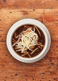 French Onion Soup recipe served on a plate, by la Madeleine French Onion Soup recipe served on a plate, by la Madeleine