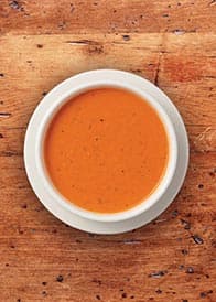 Tom Basil Soup recipe served on a plate, by la Madeleine Tom Basil Soup recipe served on a plate, by la Madeleine