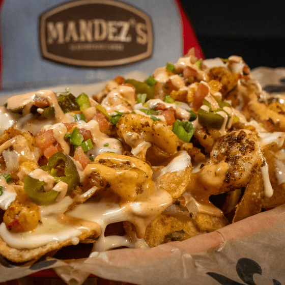 Seafood Nachos recipe served on a plate, by Mandez's Seafood Bar & Grill Seafood Nachos recipe served on a plate, by Mandez's Seafood Bar & Grill