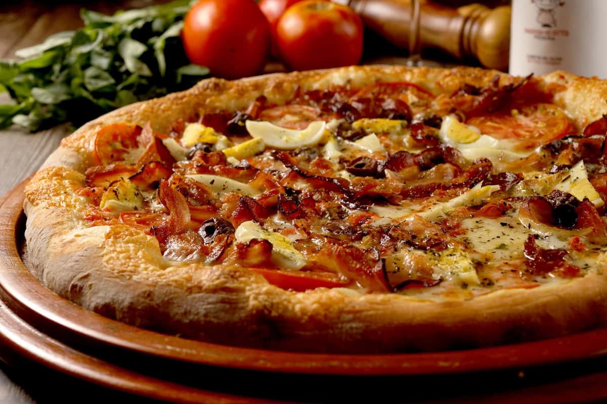 Pizza Americana recipe served on a plate, by Margherita Pizzeria Pizza Americana recipe served on a plate, by Margherita Pizzeria