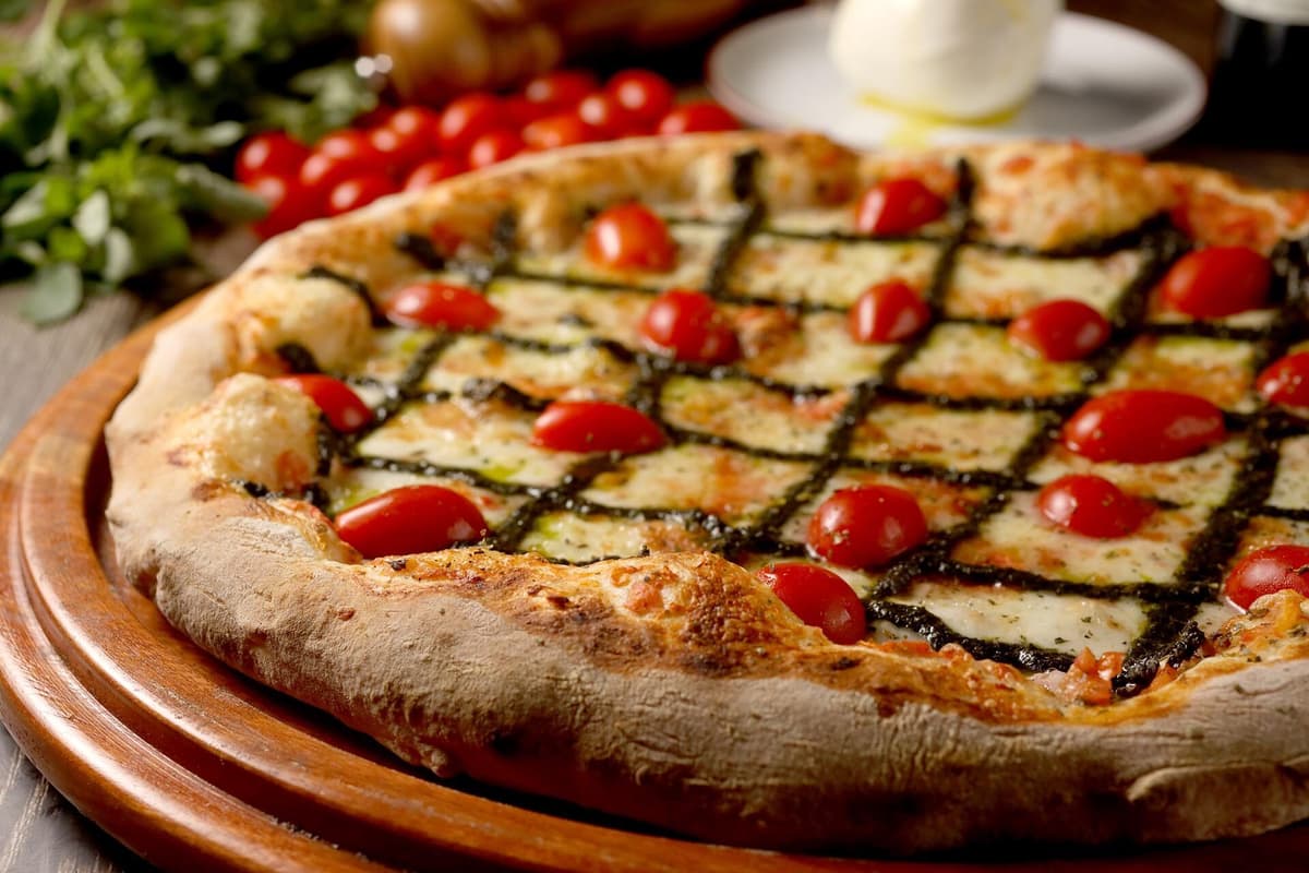 Pizza Genovese recipe served on a plate, by Margherita Pizzeria Pizza Genovese recipe served on a plate, by Margherita Pizzeria