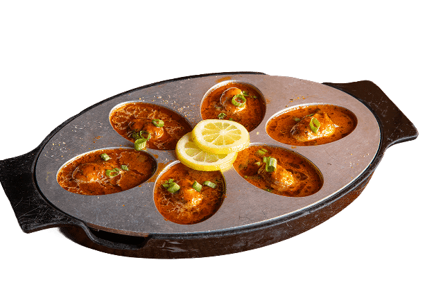 Baked or Broiled Mussels recipe served on a plate, by Middendorf's Manchac Baked or Broiled Mussels recipe served on a plate, by Middendorf's Manchac