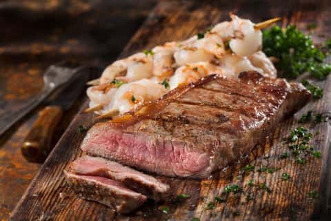 8oz New York Steak + Red Wine Peppercorn Demi-Glace recipe served on a plate, by Finns Victoria 8oz New York Steak + Red Wine Peppercorn Demi-Glace recipe served on a plate, by Finns Victoria