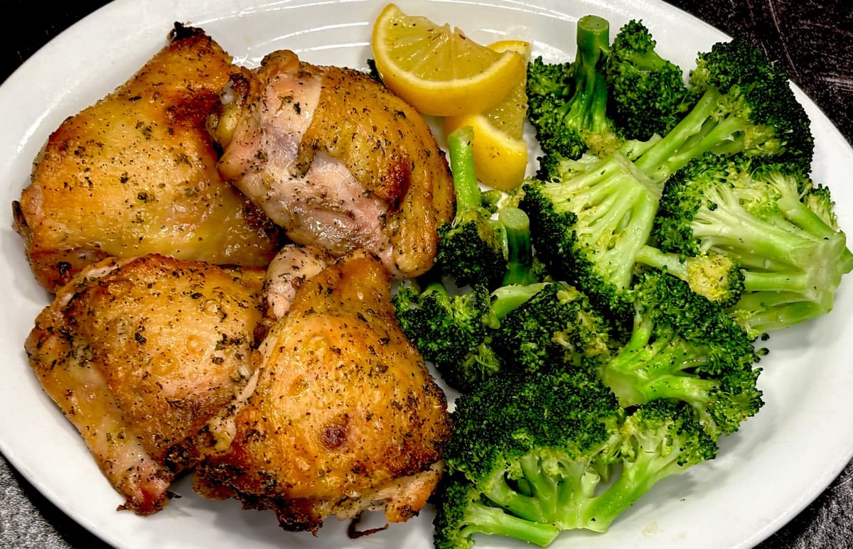 Baked Sicilian Chicken Thighs recipe served on a plate, by Angelo's Italian Restaurant - Wichita Baked Sicilian Chicken Thighs recipe served on a plate, by Angelo's Italian Restaurant - Wichita