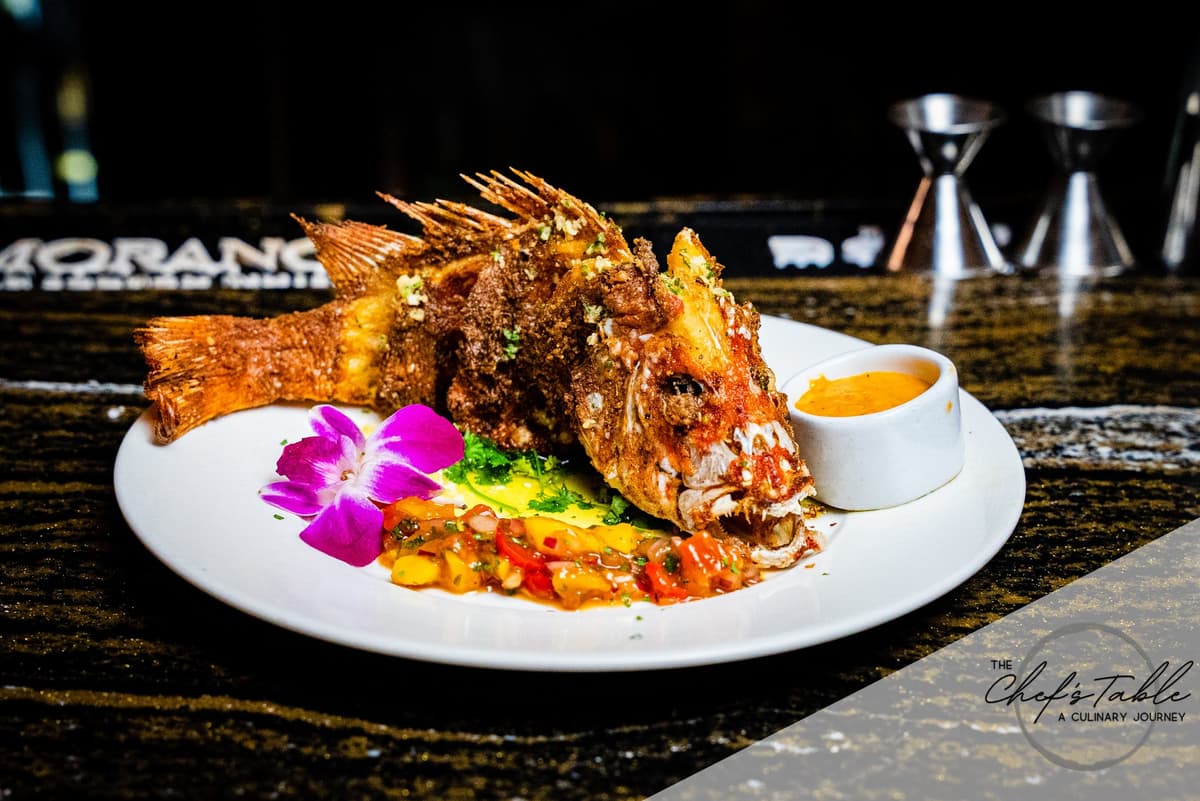 Whole Crispy Snapper - Jerk Marinade - Tropical Salsa recipe served on a plate, by The Chefs Table Houston Whole Crispy Snapper - Jerk Marinade - Tropical Salsa recipe served on a plate, by The Chefs Table Houston