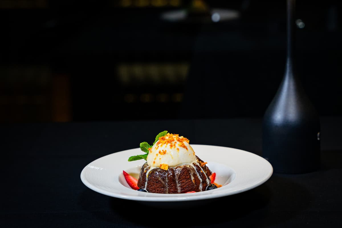 Sticky Toffee Pudding recipe served on a plate, by The Chefs Table Houston Sticky Toffee Pudding recipe served on a plate, by The Chefs Table Houston