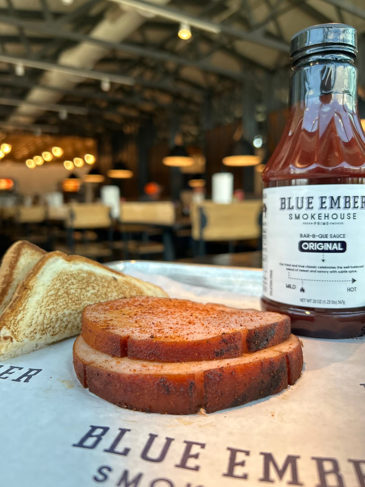 Smoked Bologna recipe served on a plate, by Blue Ember Smokehouse Smoked Bologna recipe served on a plate, by Blue Ember Smokehouse