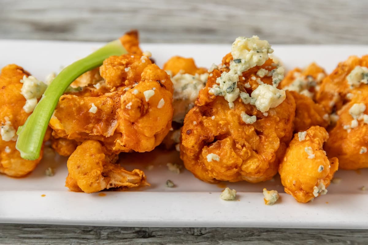 Buffalo Bleu Cauliflower recipe served on a plate, by O'Connor's Restaurant & Bar Buffalo Bleu Cauliflower recipe served on a plate, by O'Connor's Restaurant & Bar
