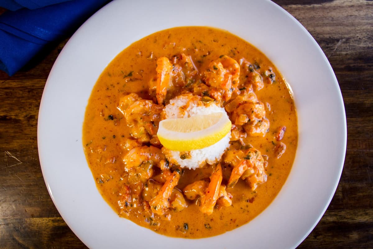 Camarones Al Mojo De Ajo recipe served on a plate, by Sonrisa Grill Camarones Al Mojo De Ajo recipe served on a plate, by Sonrisa Grill