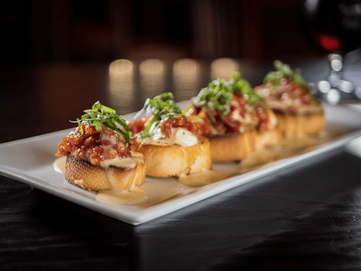 Bruschetta recipe served on a plate, by Sedona Taphouse Bruschetta recipe served on a plate, by Sedona Taphouse