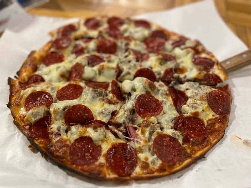 All Meat Pizza recipe served on a plate, by The Stadium Sports Bar & Casino All Meat Pizza recipe served on a plate, by The Stadium Sports Bar & Casino