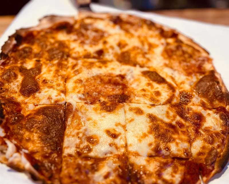 Cheese Pizza recipe served on a plate, by The Stadium Sports Bar & Casino Cheese Pizza recipe served on a plate, by The Stadium Sports Bar & Casino