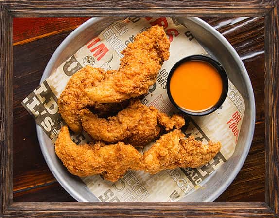 Chicken Tender Appetizer recipe served on a plate, by Wild Bill's Sports Saloon - DT St. Paul Chicken Tender Appetizer recipe served on a plate, by Wild Bill's Sports Saloon - DT St. Paul