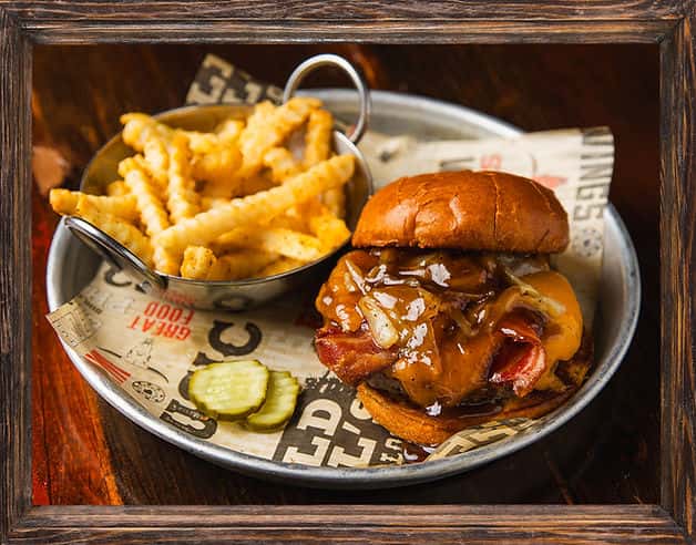 Bourbon Burger recipe served on a plate, by Wild Bill's Sports Saloon - DT St. Paul Bourbon Burger recipe served on a plate, by Wild Bill's Sports Saloon - DT St. Paul