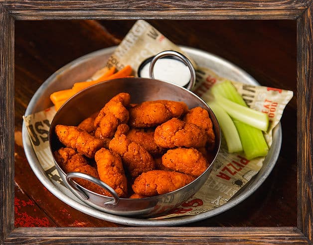 Boneless Wings recipe served on a plate, by Wild Bill's Sports Saloon - DT St. Paul Boneless Wings recipe served on a plate, by Wild Bill's Sports Saloon - DT St. Paul