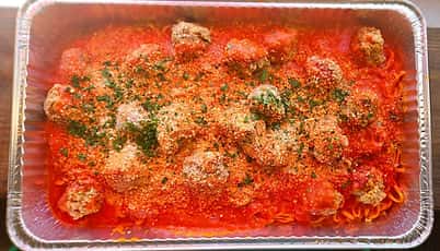 Spaghetti and meatballs recipe served on a plate, by Pasta La Fata Spaghetti and meatballs recipe served on a plate, by Pasta La Fata