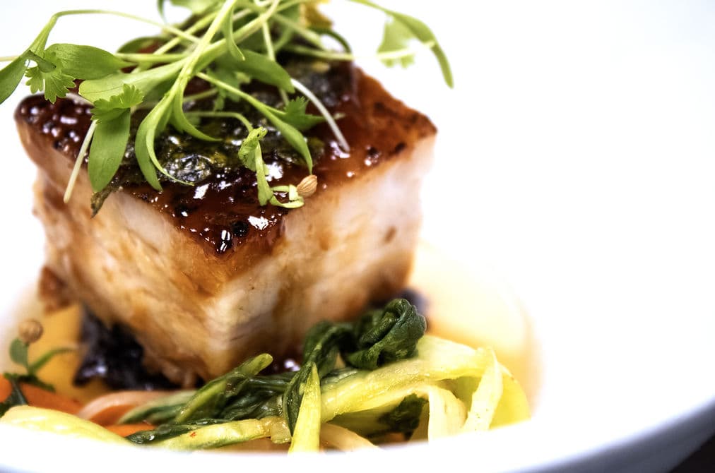 Pork Belly recipe served on a plate, by The People's Kitchen Pork Belly recipe served on a plate, by The People's Kitchen
