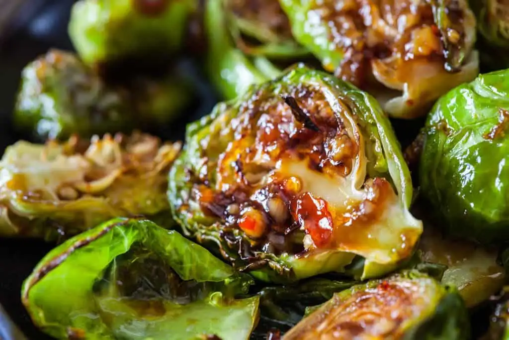 Roasted Brussels Sprouts recipe served on a plate, by Nightingale Roasted Brussels Sprouts recipe served on a plate, by Nightingale