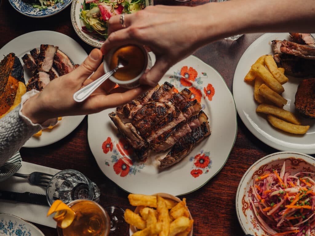 Pork Rib Eye Chop recipe served on a plate, by Blacklock Soho Pork Rib Eye Chop recipe served on a plate, by Blacklock Soho