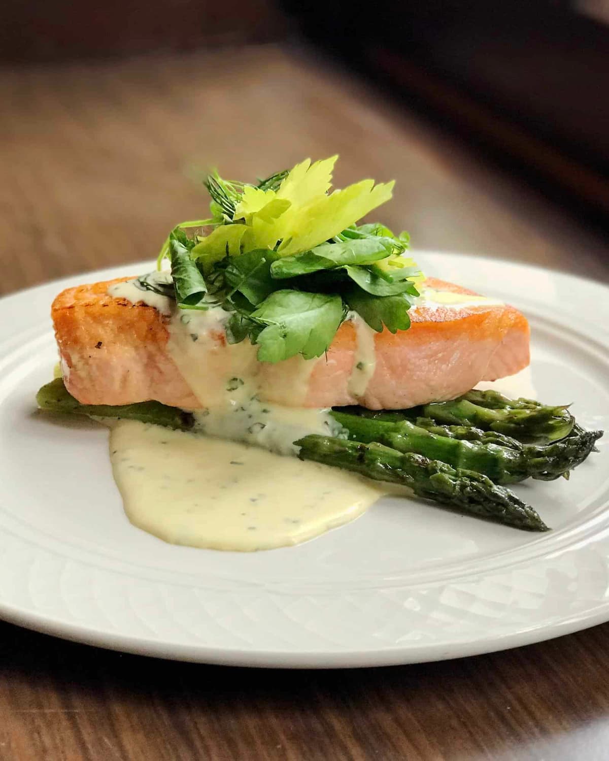 Salmon recipe served on a plate, by The Lexington Salmon recipe served on a plate, by The Lexington