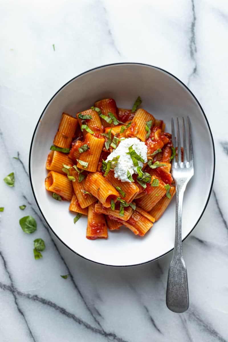 Rigatoni All'arrabbiata recipe served on a plate, by Nightingale Rigatoni All'arrabbiata recipe served on a plate, by Nightingale