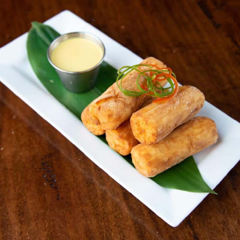 Yuca a la Huancaina recipe served on a plate, by Inka Grill Peruvian Cuisine Yuca a la Huancaina recipe served on a plate, by Inka Grill Peruvian Cuisine