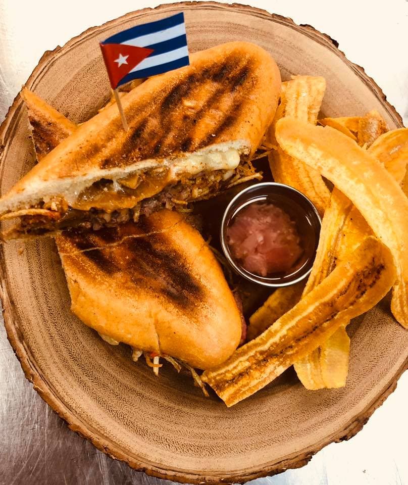 Sandwich recipe served on a plate, by La Bodeguita De Mima Cuban Restaurant and Rum Bar Sandwich recipe served on a plate, by La Bodeguita De Mima Cuban Restaurant and Rum Bar